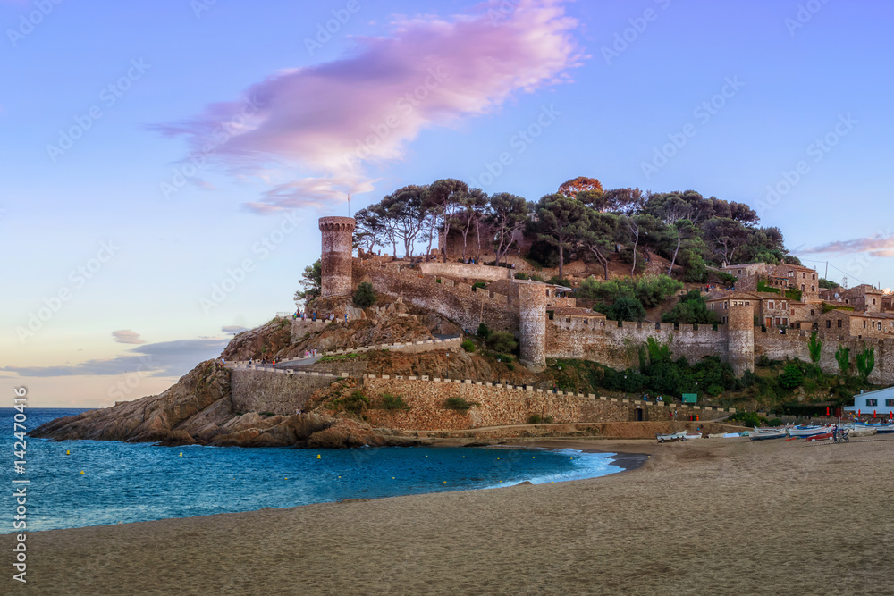 Colorful view of ruins of a medieval town and castle at Tossa de Mar, Costa Brava, Catalonia, Spain