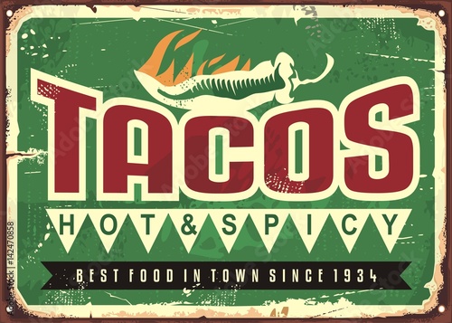 Hot and spicy tacos advertise on old green metal background