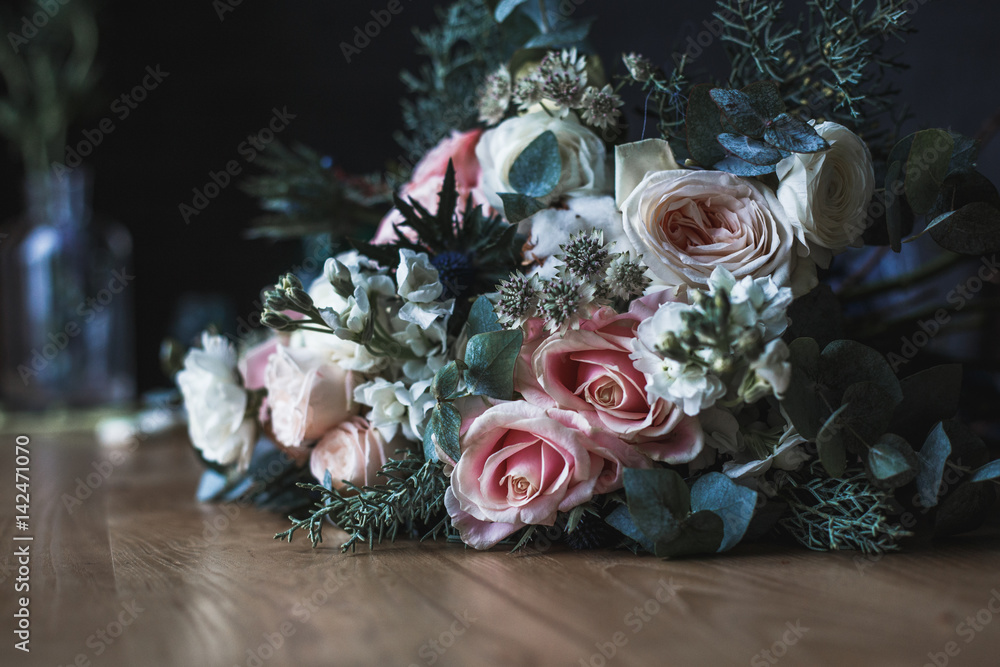 Florist workplace: flowers and accessories on a vintage wooden table. soft  focus. Modern bouquet in a vase on a table, simple composition Stock Photo  by ©cherry_daria 147713707