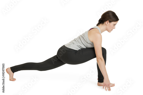 Yoga woman gray position_ashva sanchalanasana photo
