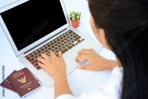 A female hands working with laptop