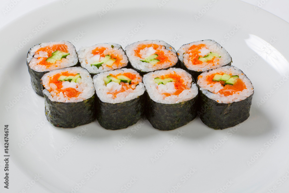 sake avocado maki sushi on a white plate sake avocado maki sushi on a white plate