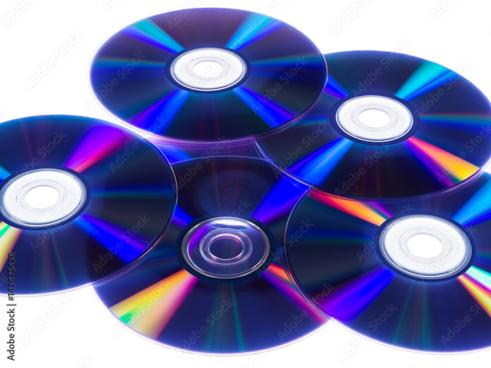 CDs with colorful reflections on white isolated background CDs with colorful reflections on white isolated background