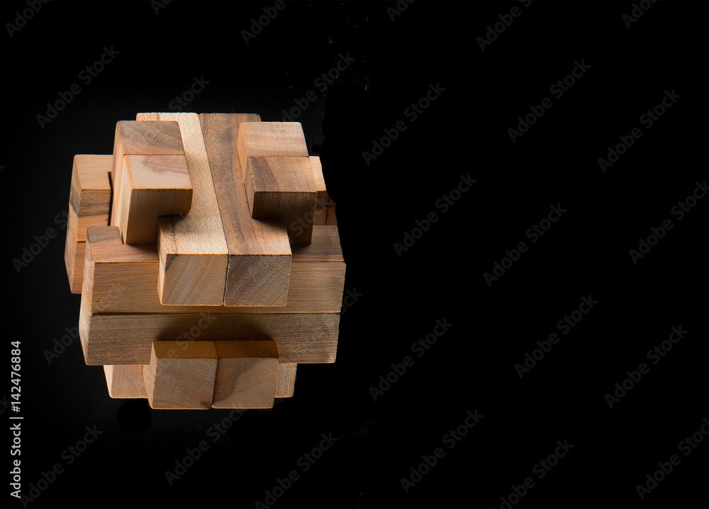 The wooden puzzle - game with blocks The wooden puzzle - game with blocks