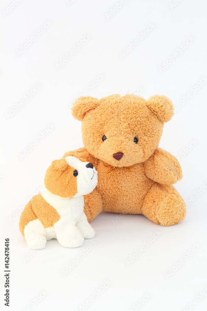 Teddy Bear and brown dog dolls, brown ears on a white background. Teddy Bear and brown dog dolls, brown ears on a white background.