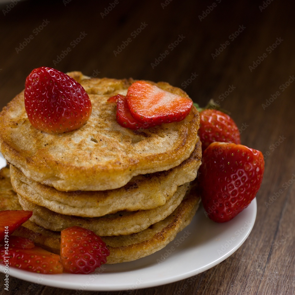 Stack of homemade wholegrain buckwheat pancakes. Individually fried on pan, thus imperfect shape Stack of homemade wholegrain buckwheat pancakes. Individually fried on pan, thus imperfect shape