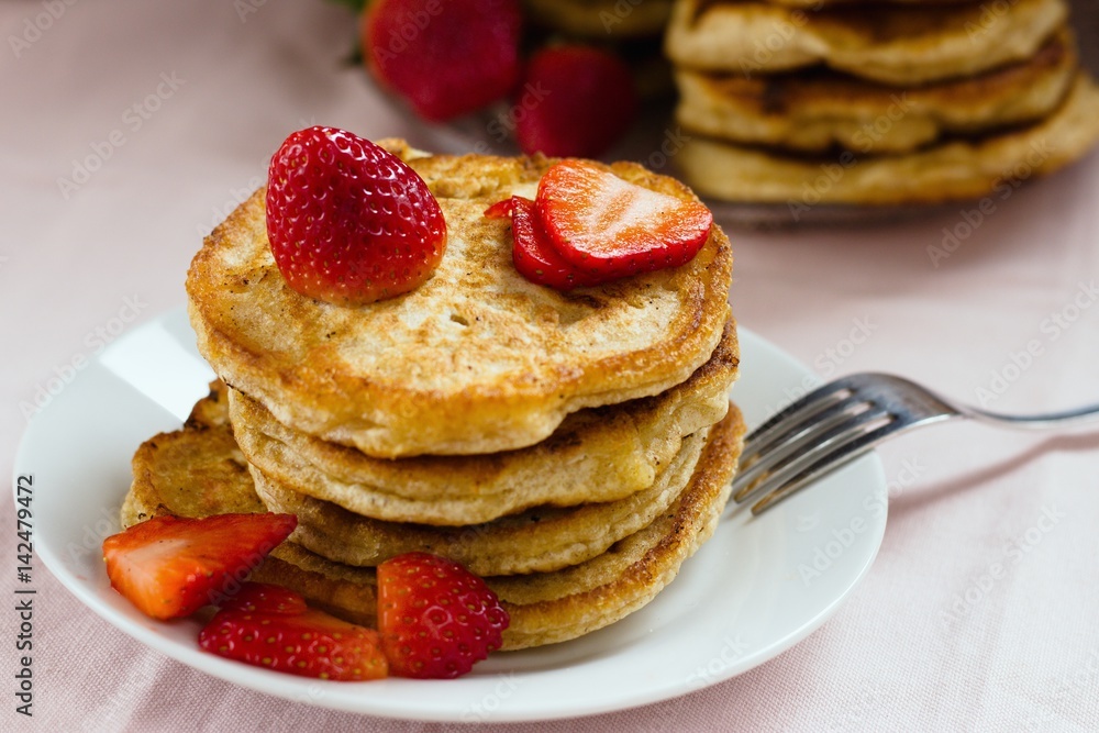 Stack of homemade wholegrain buckwheat pancakes. Individually fried on pan, thus imperfect shape Stack of homemade wholegrain buckwheat pancakes. Individually fried on pan, thus imperfect shape