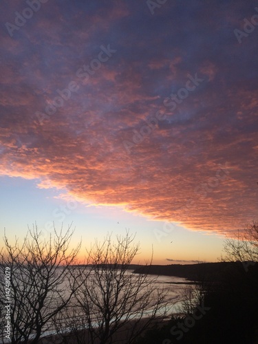 North Sea coast at dawn. Rosy fingered dawn. Scarborough  North Yorkshire  Enland