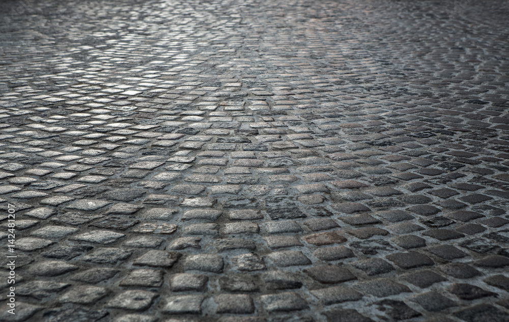Empty old cobblestone street background with copy space