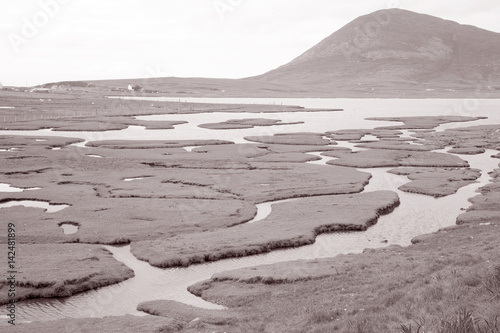 Salt Flats, Isle of Harris, Scotland, UK in Black and White Sepia Tone photo