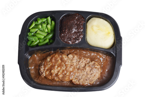 Fotografie isolated salisbury steak tv dinner with brownie
