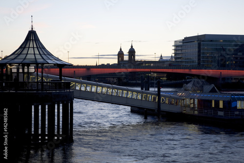 Ferry Pier and London Bridge on the River Thames  London