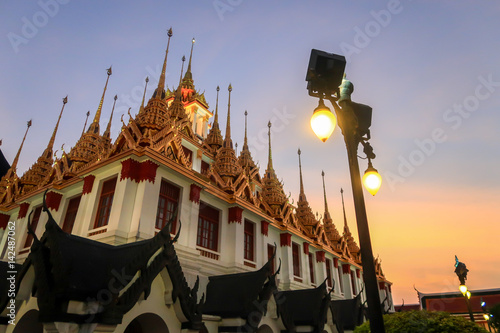 The metal castle of ratchanatda temple, bangkok, thailand at sunset time. photo