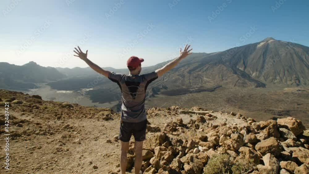 Happy Young Man Raising His Hands Several Times