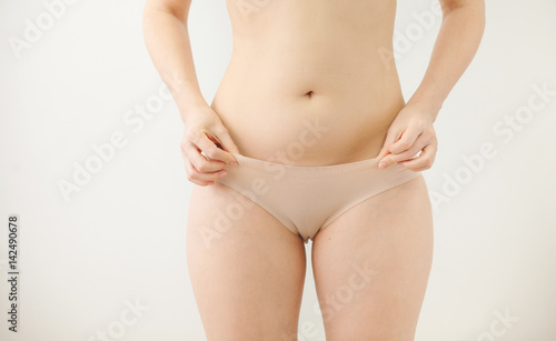 Woman in beige underwear © photo_mts