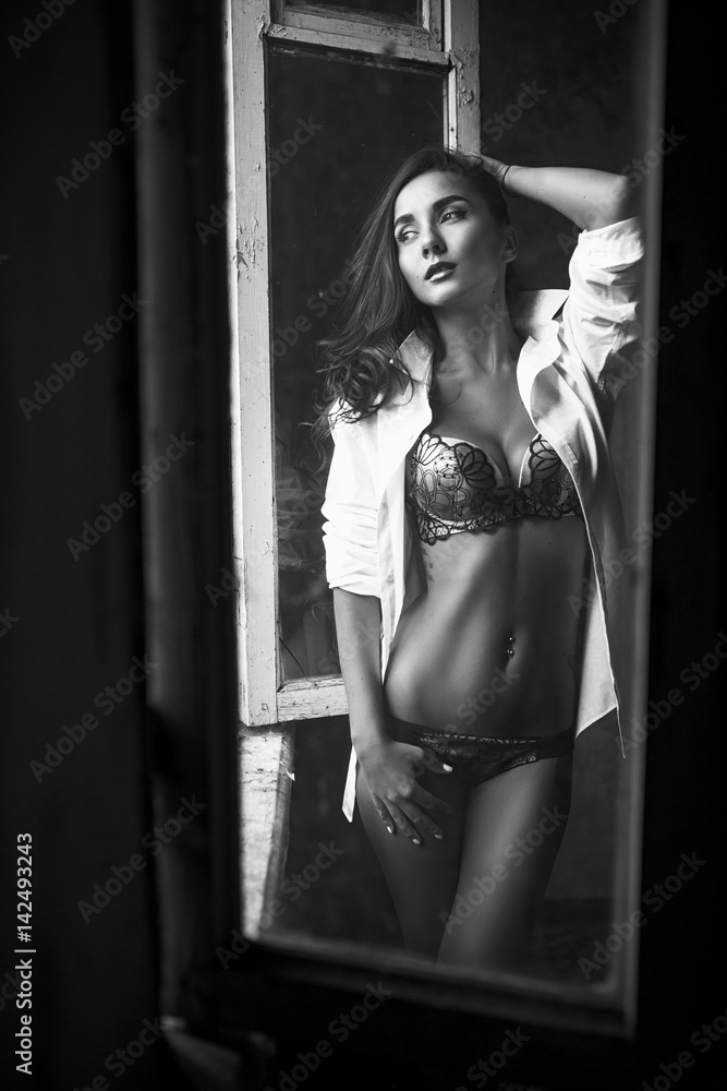 Young woman in black bra and panties isolated on white Stock Photo by  ©rilueda 51967285