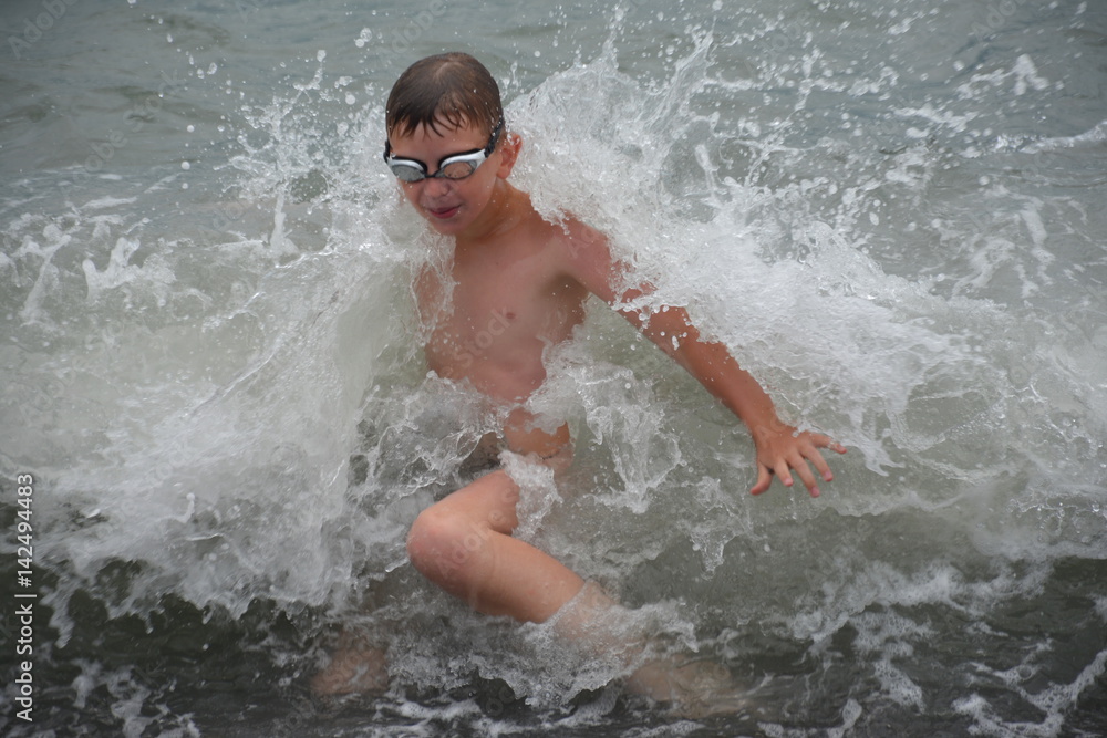 boy on the waves