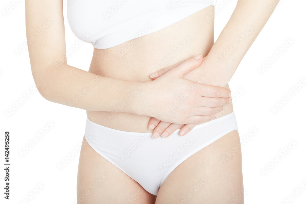 Woman with lateral abdominal pain isolated on white, clipping path Woman with lateral abdominal pain isolated on white, clipping path