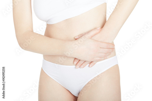 Woman with lateral abdominal pain isolated on white, clipping path