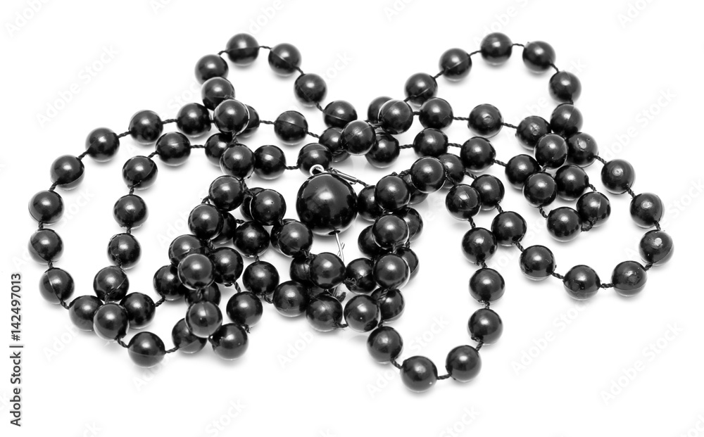 Black beads on a white background Black beads on a white background