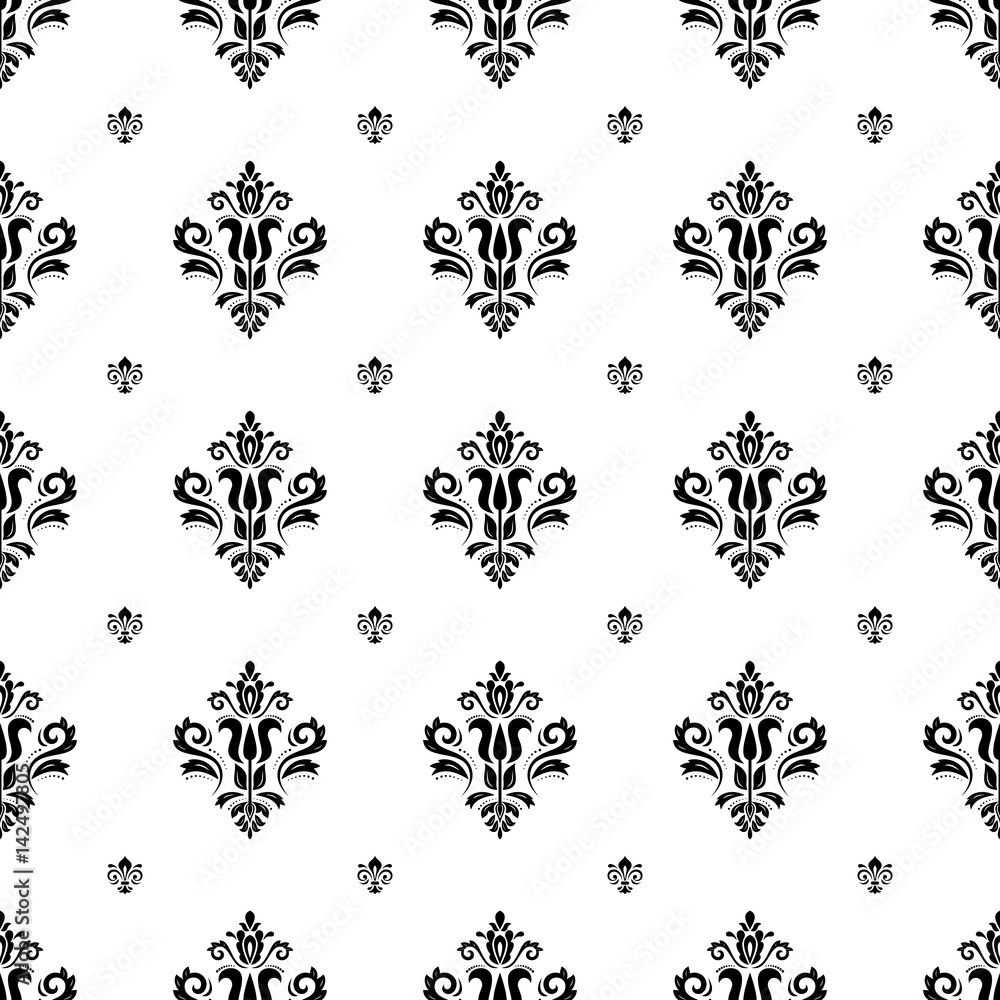 Seamless vector black and white pattern. Modern geometric ornament with royal lilies. Classic vintage background