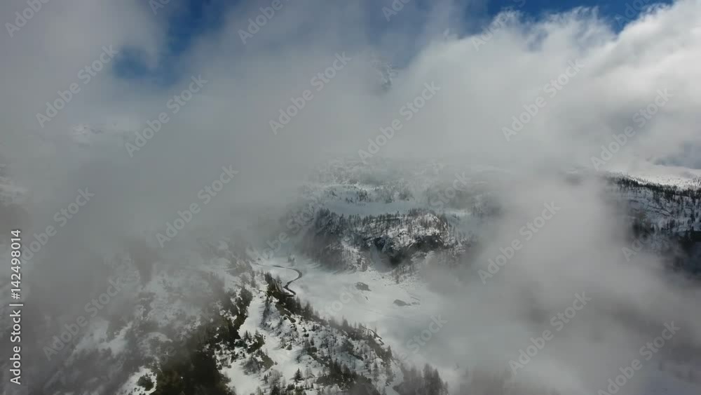 Aerial view over the clouds - High mountain Aerial view over the clouds - High mountain