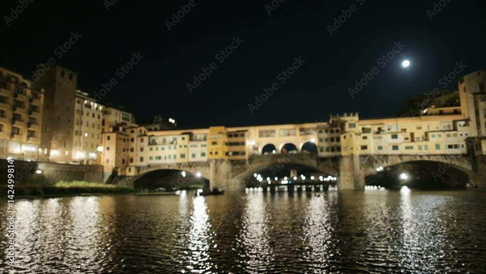 Tuscany Florence Old Bridge view from boat by night Tuscany Florence Old Bridge view from boat by night
