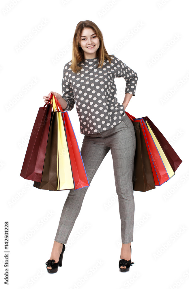 Young brunette woman with some shopping bags Young brunette woman with some shopping bags