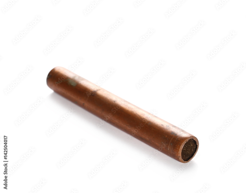 Rusty old copper pipe for heating, isolated on white background