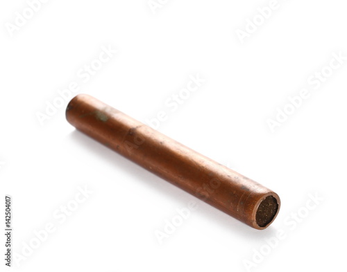 Rusty old copper pipe for heating  isolated on white background