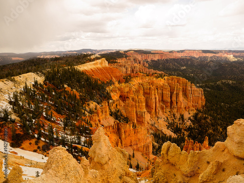 Bryce Canyon National Park, a sprawling reserve in southern Utah, is known for crimson-colored hoodoos, which are spire-shaped rock formations.