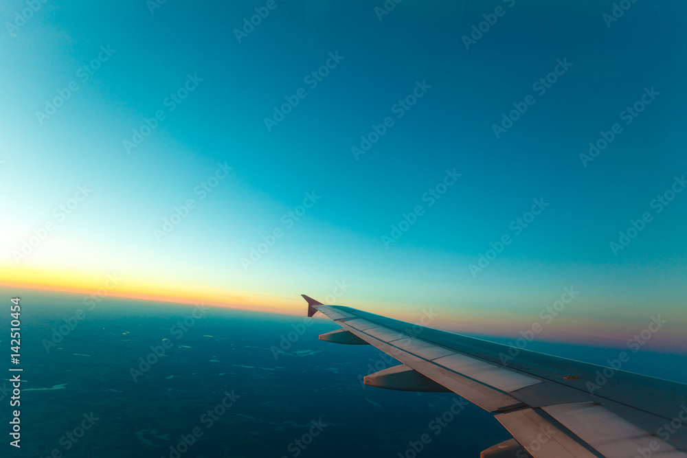 Naklejka premium View from plane window. Clear sky