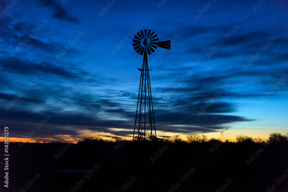 Dawn is breaking - Nebraska windmill at sunrise Dawn is breaking - Nebraska windmill at sunrise