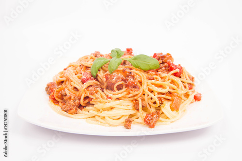 Spaghetti bolognese on a white background