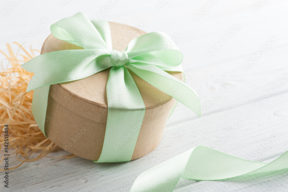 Gift box with green ribbon Gift box with green ribbon