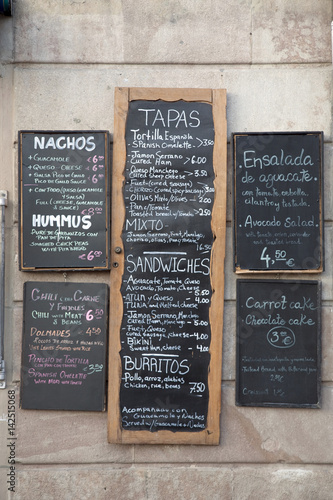 Obraz na płótnie Various Spanish Menus on a Wall in Spain w salonie