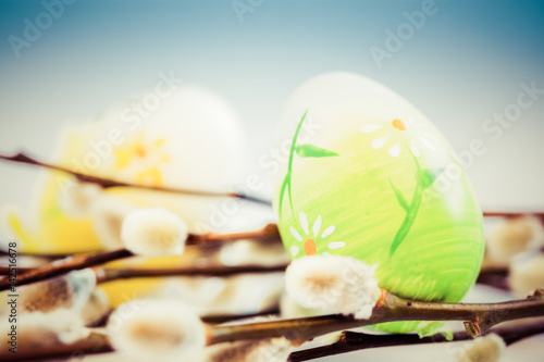 easter background with pussy-willow and colored eggs - copy space