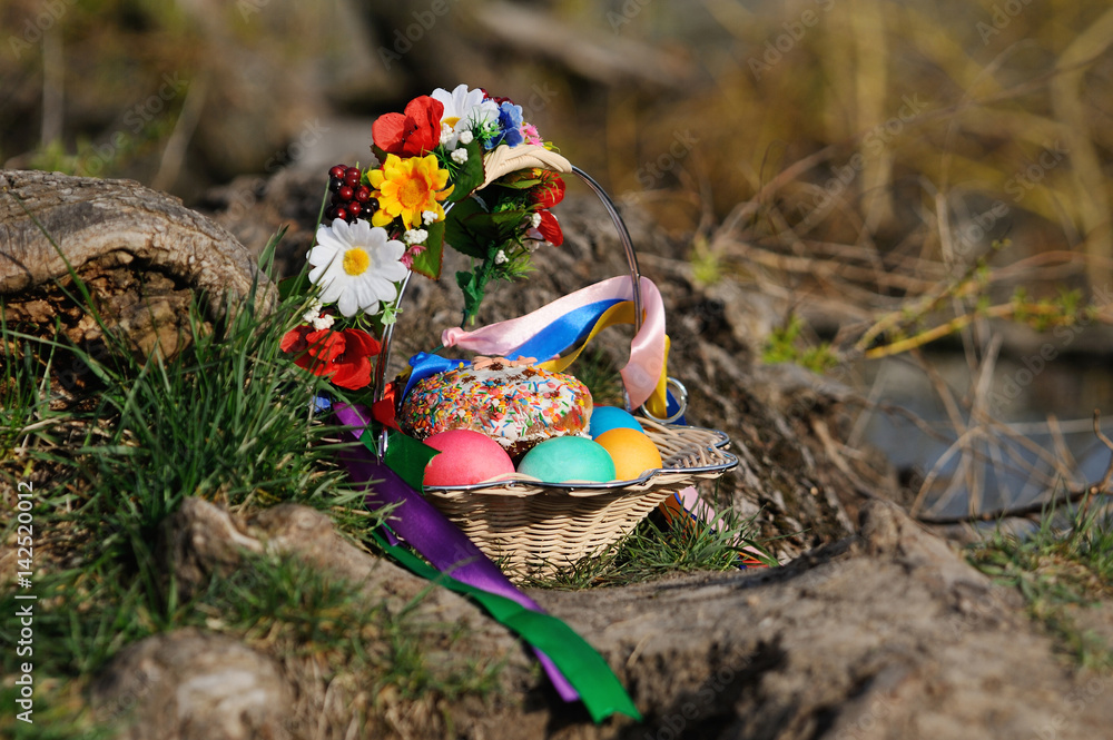 Easter basket on the river bank