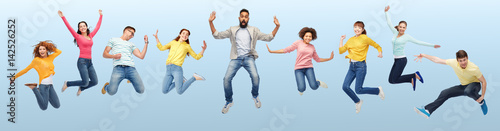 international group of happy people jumping