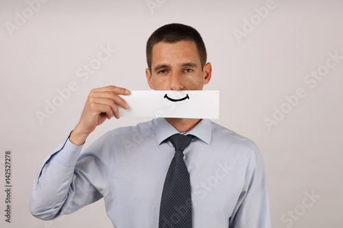 Εκτύπωση καμβά Disgruntled, unsatisfied employee with artificial smile