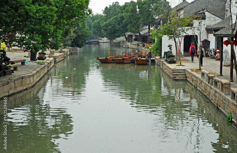 China, Shanghai water village Tongli. Life along a village canal.
