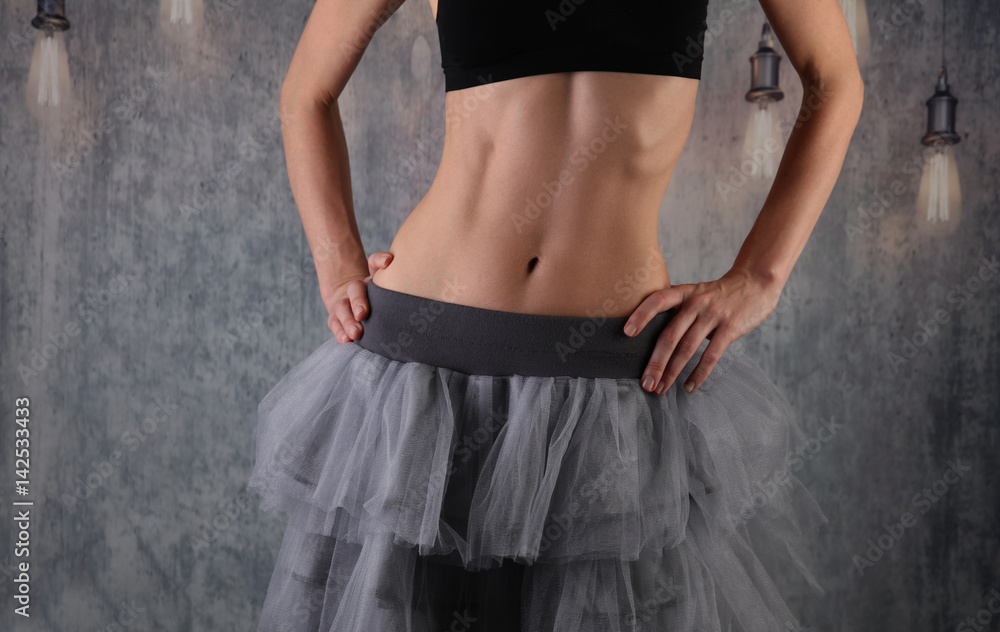 Beautiful slim woman body , waist. Sport, fitness woman during dancing / modern ballet workout Beautiful slim woman body , waist. Sport, fitness woman during dancing / modern ballet workout