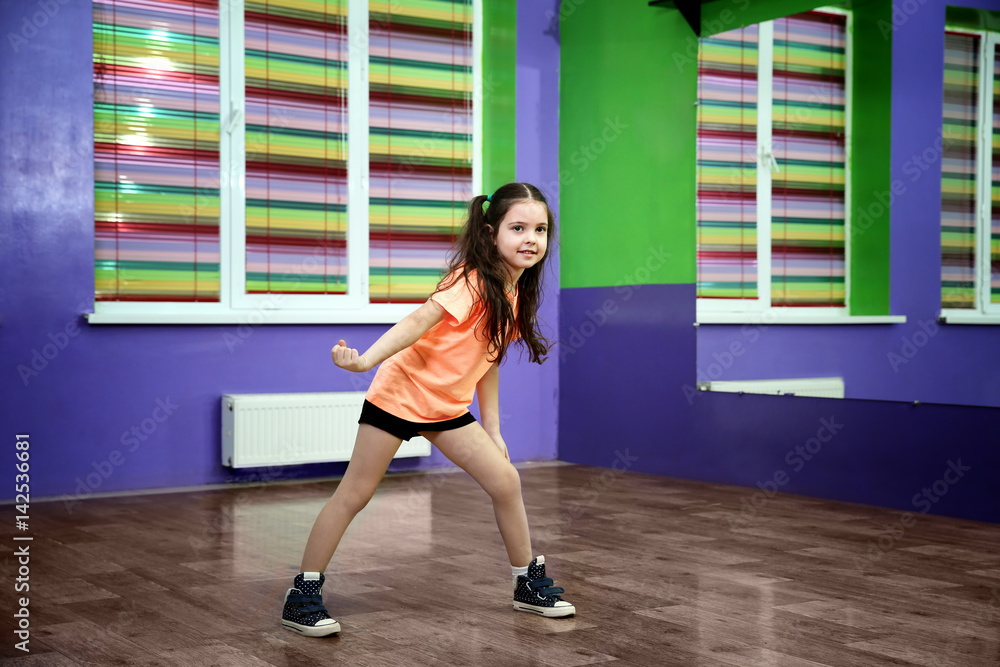 Cute little girl dancing in choreography class Cute little girl dancing in choreography class