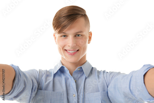 Handsome young man taking s...