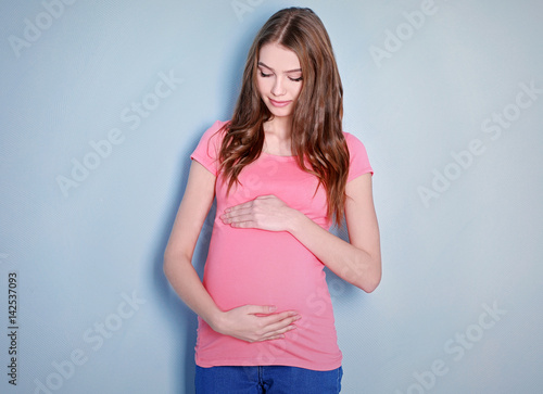 Beautiful pregnant woman on...