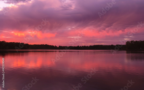 Beautiful sunset over a lake in summer time