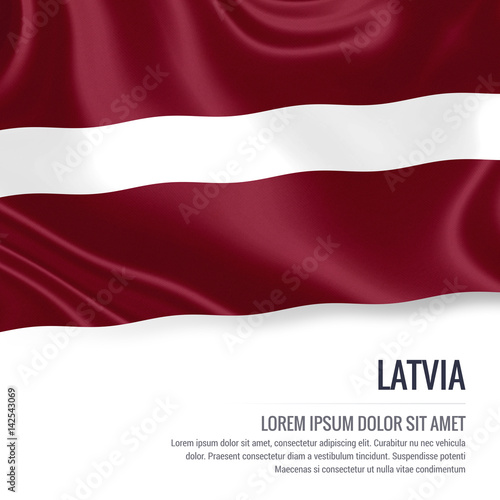 Silky flag of Latvia waving on an isolated white background with the white text area for your advert message. 3D rendering.