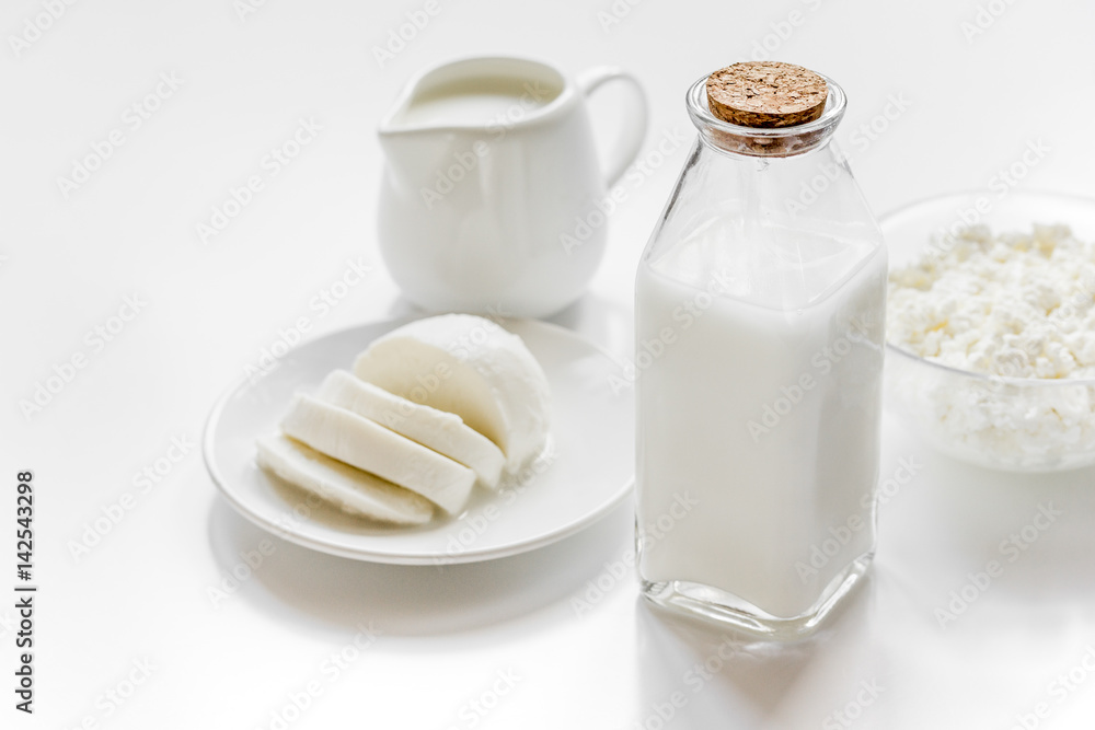 monochrome concept with dairy products on white table monochrome concept with dairy products on white table