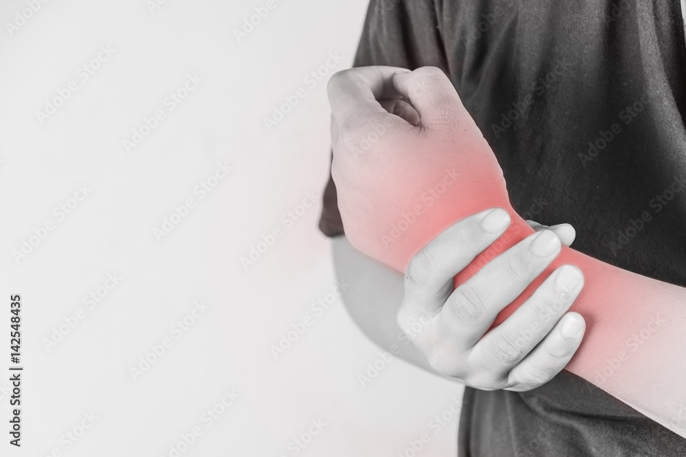 wrist injury in humans .wrist pain,joint pains people medical, mono tone highlight at wrist