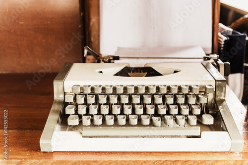 Принти на полотні antique typewriter; old typewriter on wooden table, retro filtered